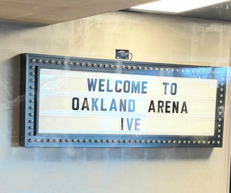 Picture of a sign in Oakland Arena for IVE